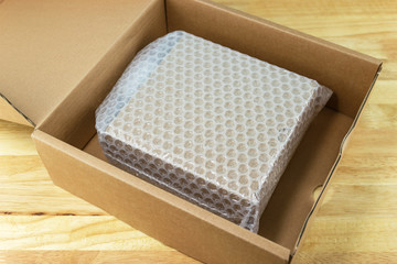 Bubbles covering the box by bubble wrap for protection product
