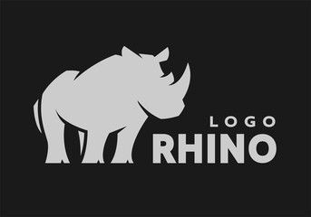 African rhino silhouette. Logo, symbol on a dark background. Vector illustration.
