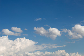 Obraz premium Bright blue sky with white clouds for background or wallpapers