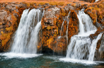 Kirkjufell waterfalls in autumn season, Iceland