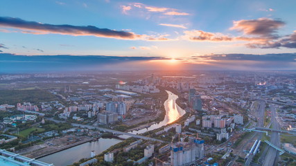 Aerial top view of Moscow city timelapse at sunset. Form from the observation platform of the business center of Moscow City.