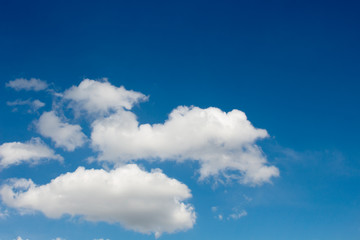 Obraz premium Bright blue sky with white clouds for background or wallpapers