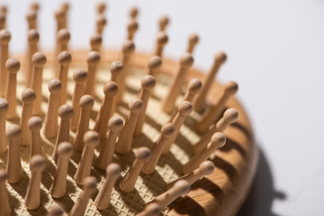 Selective focus of hair brush on white background, zero waste concept