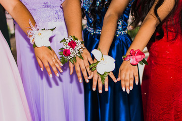 hands of bride and groom with bouquet of flowers tulips girls prom party graduation © Fabio