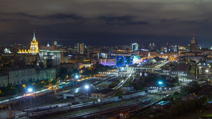 Fototapeta na wymiar Nighttime panoramic view to Kiev Railway Station timelapse and modern city in Moscow, Russia