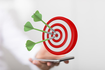 Dart arrow on target dartboard, Business success concept..