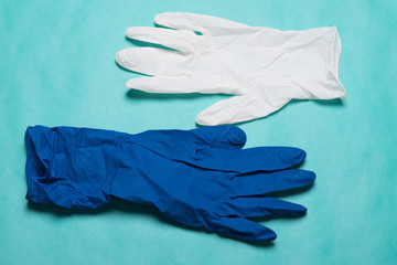 Surgical gloves. Medical glove on a blue background.