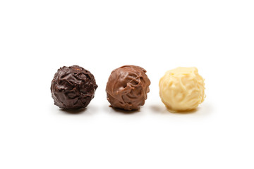 Chocolate truffle isolated on white background.