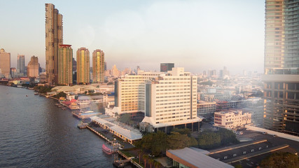 Fototapeta na wymiar Bangkok, Thailand. Sunset aerial view of Asiatique Riverfront with cityscape and Chao Phraya River