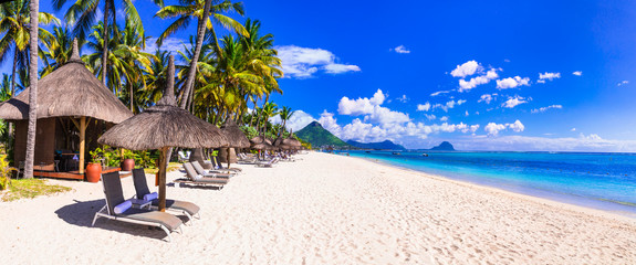 Most beautiful beaches of Mauritius island - Flic en Flac. Tropical holidays - obrazy, fototapety, plakaty