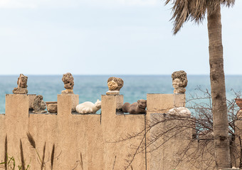 Decorative fence with figures in old Yafo in Israel