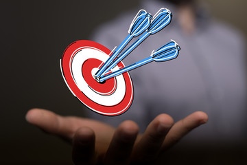 dart target arrow hitting on bullseye which is the ultimate goal that everyone wants.