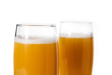 Bellini champagne cocktail in glass isolated on white background. Close up