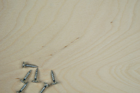  silver screws on panel