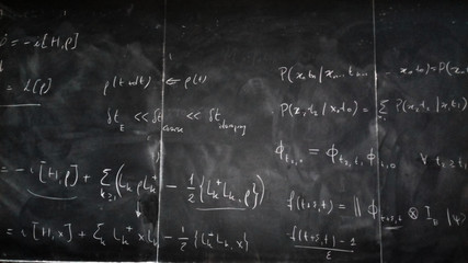 blackboard with mathematical formulas on it