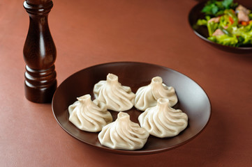 Georgian manta rays in a plate on a brown table