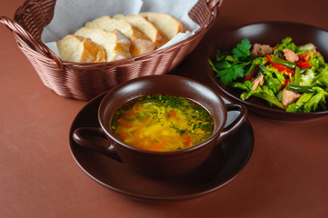 Soup with noodles and salad. Georgian lunch