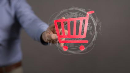 Businessman pressing modern technology panel shopping cart web phone credit card.