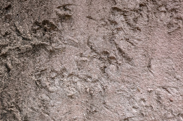 rough stone wall in brown color