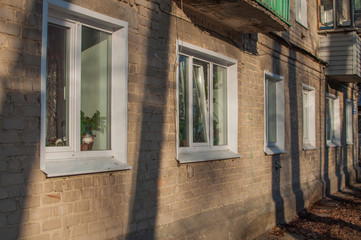 Windows of the first floor of an apartment building