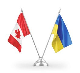 Ukraine and Canada table flags isolated on white 3D rendering