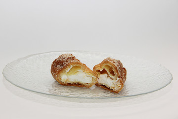 fresh croissant cut on a white background