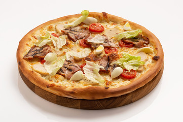 Pizza with bacon, cheese, egg and tomatoes. Close up.