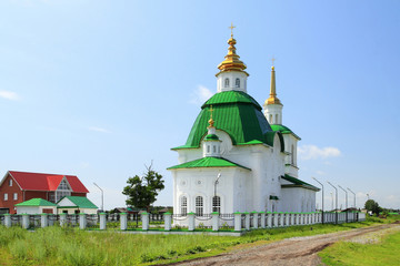 Fototapeta na wymiar Orthodox Church in the summer in the village of Preobrazhenka in the vicinity of the city of Tobolsk in Russia
