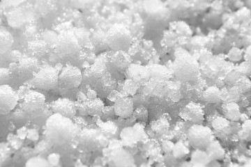 Graupel, snow pellets or soft hail texture, background. Form of precipitation