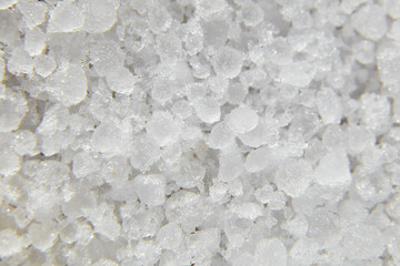 Graupel, snow pellets or soft hail texture, background. Form of precipitation