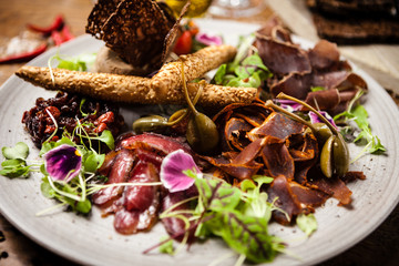 Meat platter for two served on a plate in restaurant