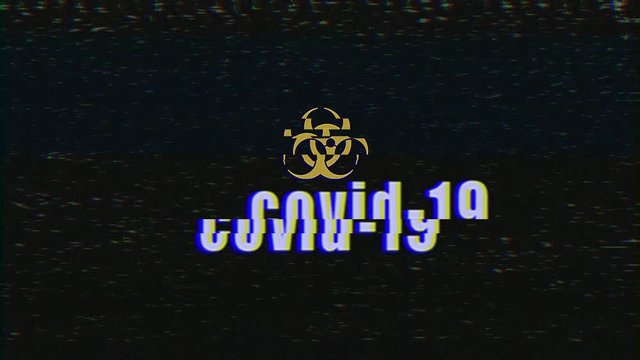 Video animation of a television screen with noise and the message covid-19. Generated with glitch effect. Abstract background.