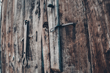 Wooden door with old metal lock