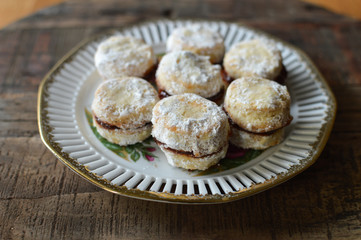 Serbian traditional homemade vanilla cookies(vanilice) with jam and powdered sugar