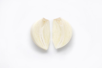 young garlic cut in two isolated on white background. closeup of fresh white garlic. organic natural food, vegetables concept
