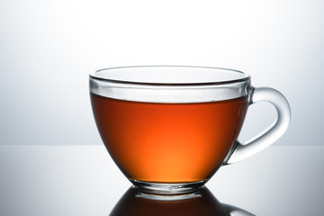 tea in cup isolated on white background