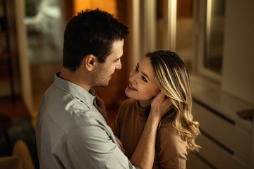 Fototapeta premium Young happy couple in love looking at each other.