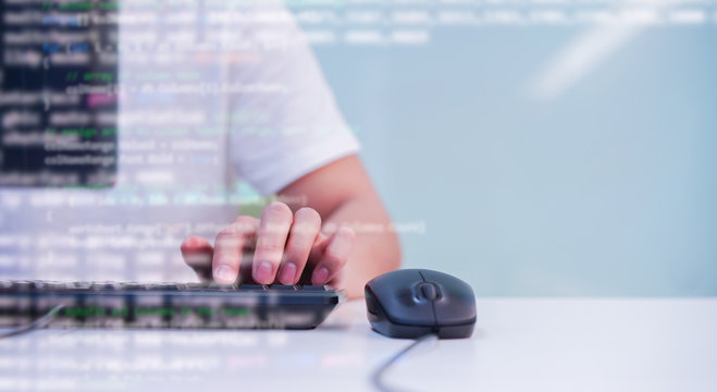 close up programmer man hand typing on keyboard at desktop pc to input code language into software for study bug and defect of system at office for  development of technology concept