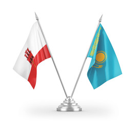 Kazakhstan and Gibraltar table flags isolated on white 3D rendering
