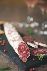 Fuet sausage with spices and herbs