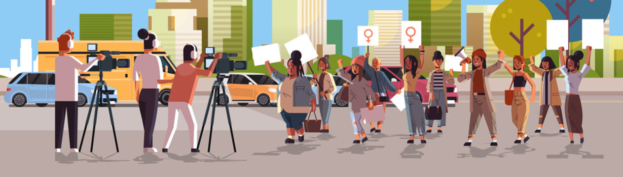 journalists reporting breaking news from street protest activists holding placards feminist demonstration girl power movement women empowerment concept cityscape background horizontal full length