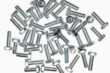 Bolts on a white background.  Fixing material, top view
