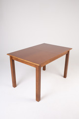 Single brown table with empty surface on an isolated white background