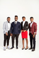 Obraz premium team of young african people in suits on a white background