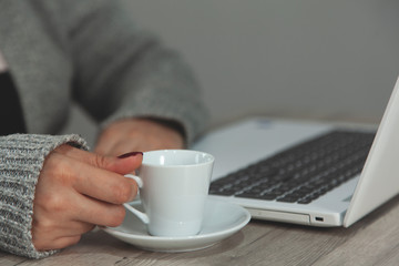 woman hand cup of coffee