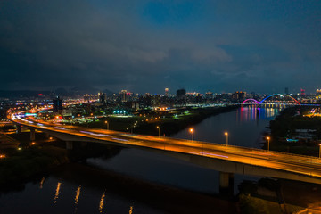 Crescent Bridge - landmark of New Taipei, Taiwan with beautiful illumination at night, photography in New Taipei, Taiwan.