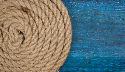 Vintage background with wooden log and hemp rope