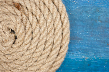 Vintage background with wooden log and hemp rope