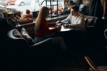 young people adore each other, like to spend time. side view photo. desire concept