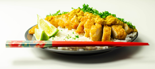 Crispy chicken perked up with an aromatic katsu curry sauce and fragrant fluffy rice